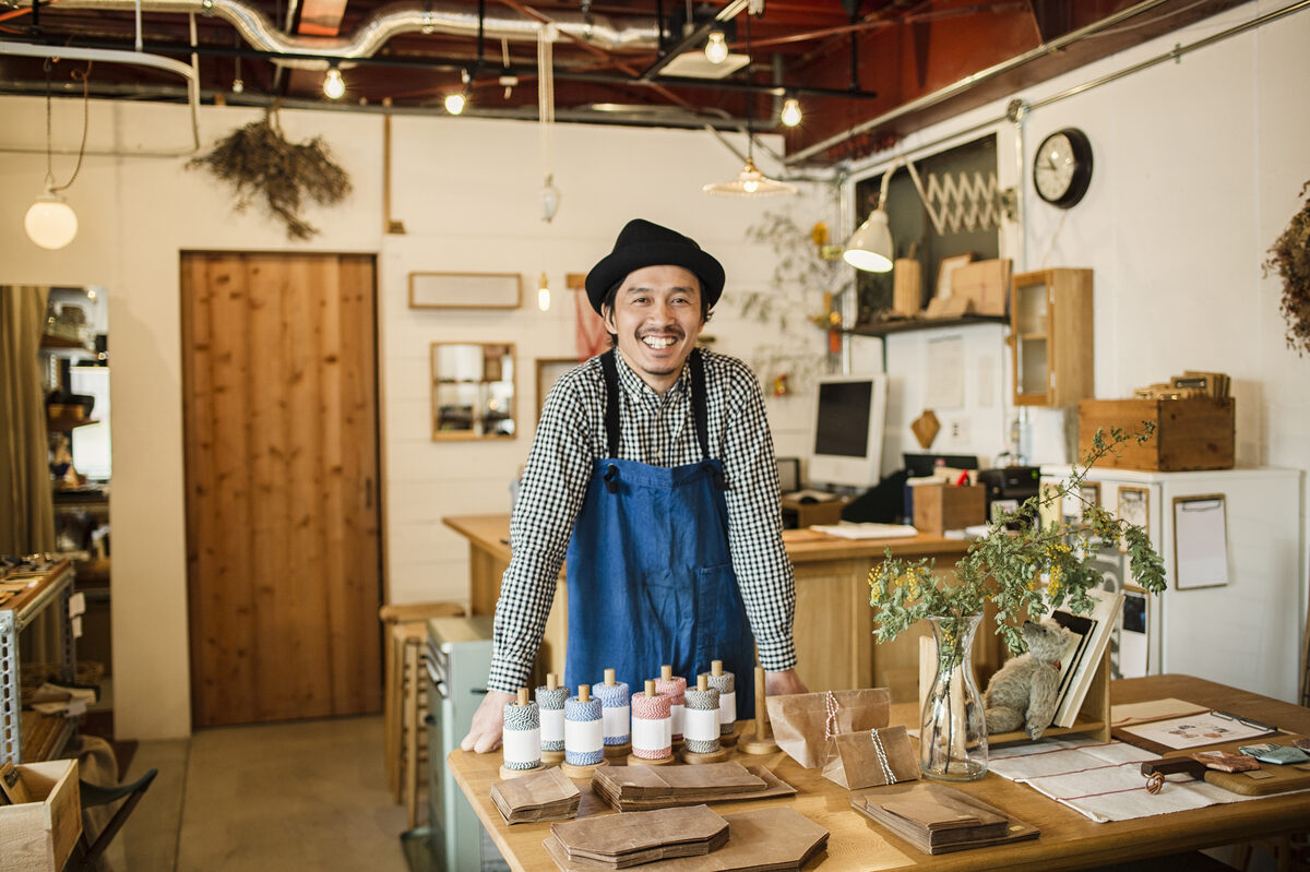 Shop owner in his store